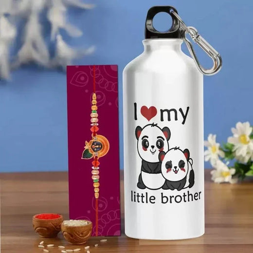 White water bottle with panda design and text, accompanied by a colorful Rakhi and traditional items on a wooden surface.