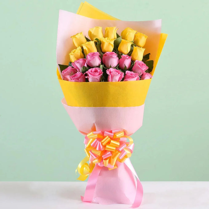21 Mixed Roses Bouquet with Pink & Yellow Wrapping - Flower Delivery in GiftsGhaziabad