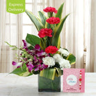 Purple Orchids & Carnations in Glass Vase with Rakhi customer review image
