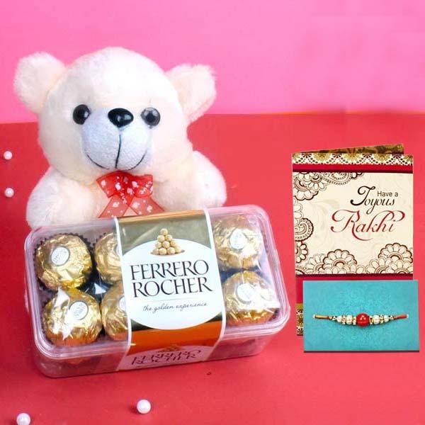 Gift set with white teddy bear, Ferrero Rocher chocolates, Rakhi, and Raksha Bandhan card
