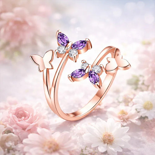 Rose gold ring with purple gemstones on a floral background