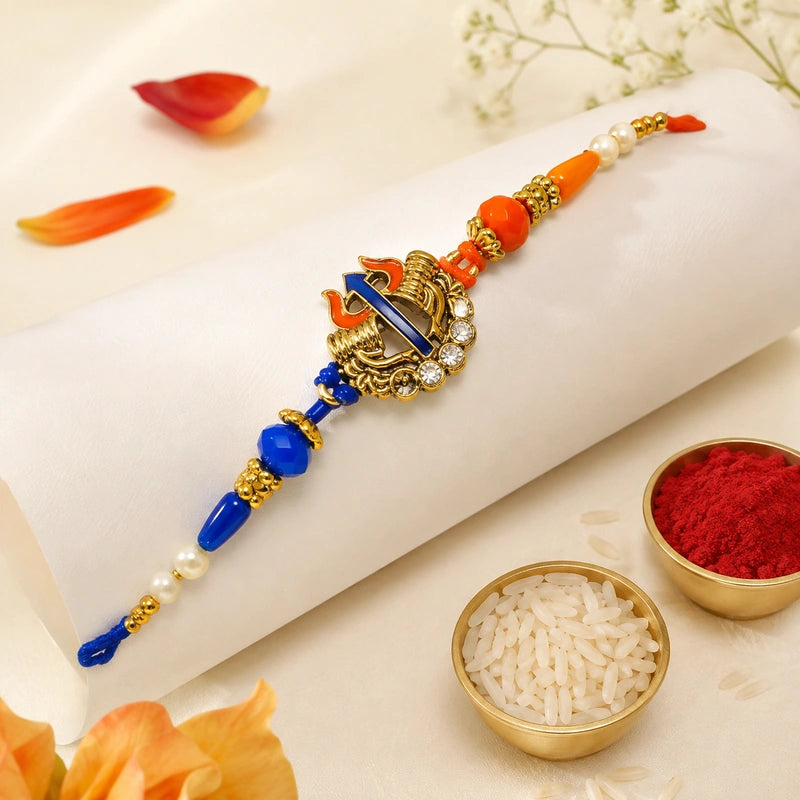 Royal Trishul Blue and Orange Rakhi - OyeGifts