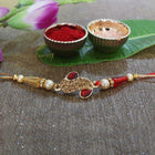 Dazzling Red and  Golden Rakhi Online customer review image
