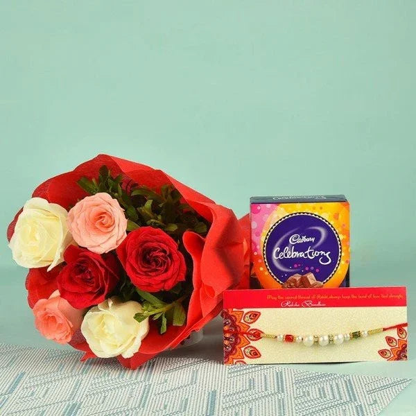 Bouquet of roses, chocolate box, and rakhi on display for Raksha Bandhan gifting.