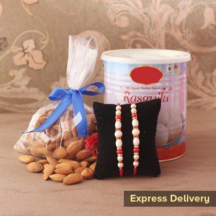 Rakhi gift set with two rakhis, sweets tin, and almonds, express delivery available