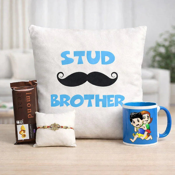 Decorative pillow with 'Stud Brother' text, mug with characters, and chocolate bar on a surface.