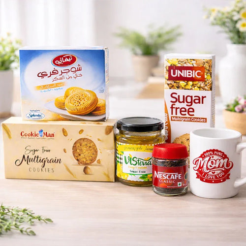 Assorted food items including cookies, Nescafe, and a mug on a table