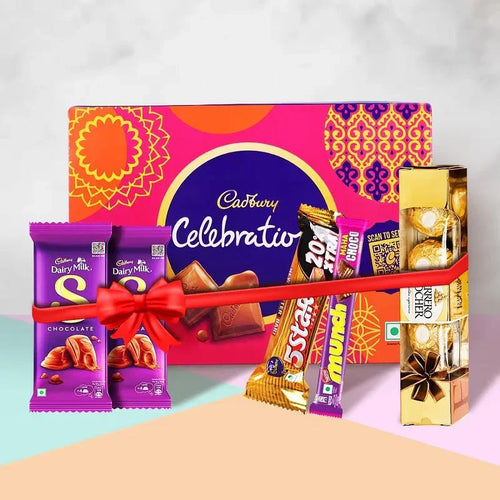 Assorted Cadbury chocolate bars and a celebratory box on a colorful background
