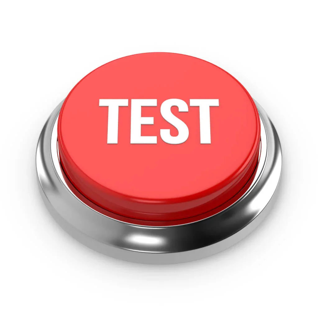Red button with 'TEST' on a white background