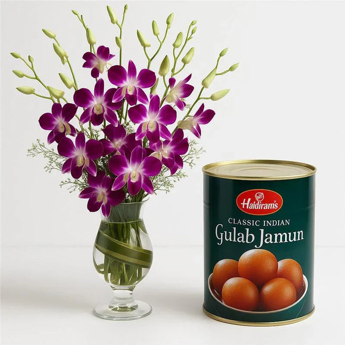 Purple Orchid Arrangement with 1kg Gulab Jamun in Glass Vase - Flower Delivery in Kalyani