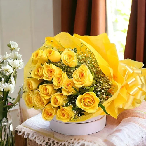 Bouquet of fresh yellow roses wrapped in yellow paper, perfect for gifting occasions