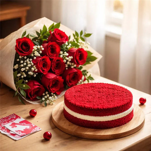 Red velvet cake with bouquet of red roses and greeting cards on wooden table
