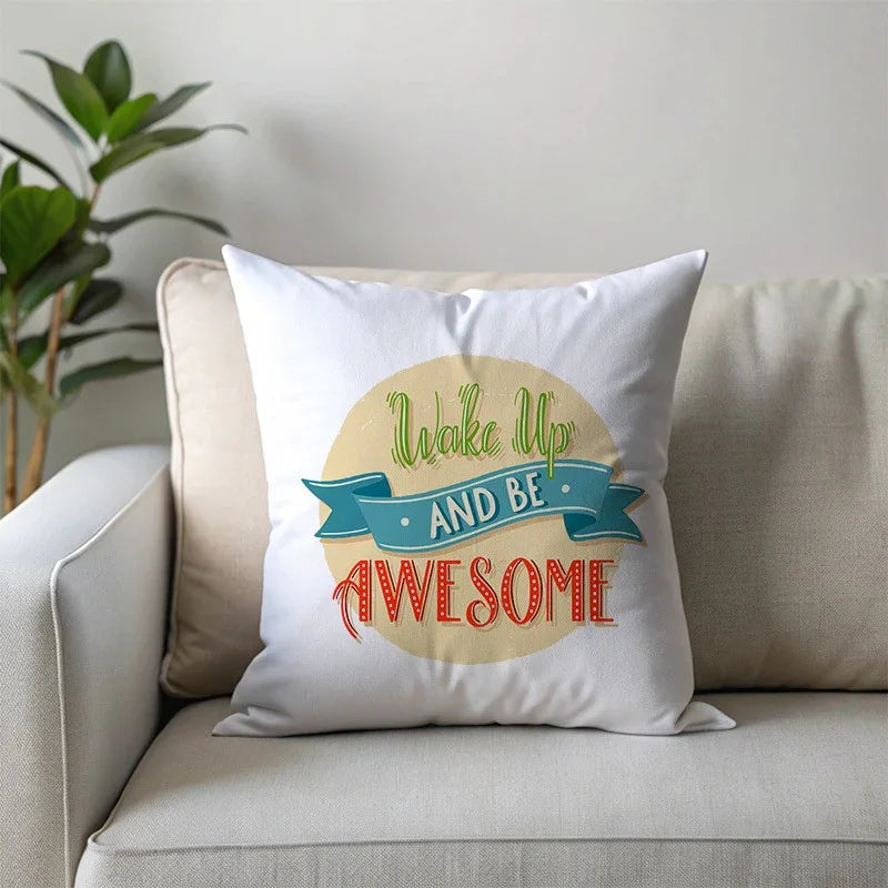 Decorative pillow with 'Wake Up and Be Awesome' text on a couch