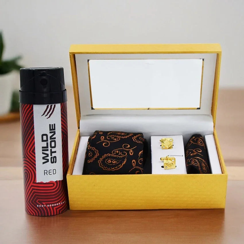 Gift set with Wild Stone body spray, black boxer briefs, and cufflinks in a yellow box.