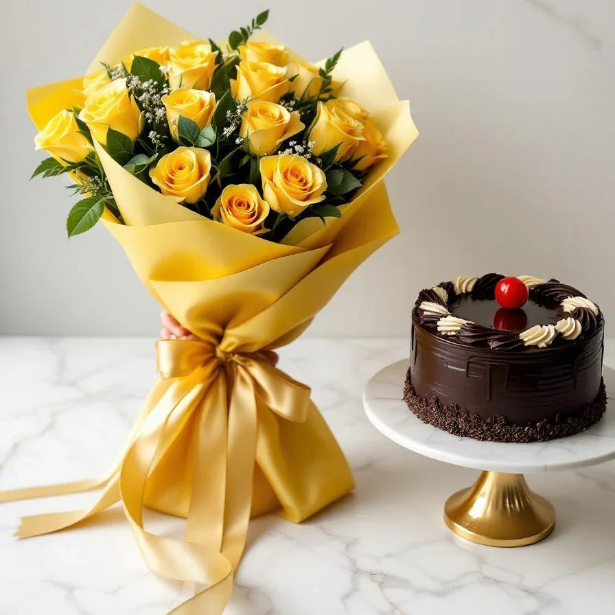 Bouquet of yellow roses wrapped in yellow paper with a chocolate cake on a marble surface.