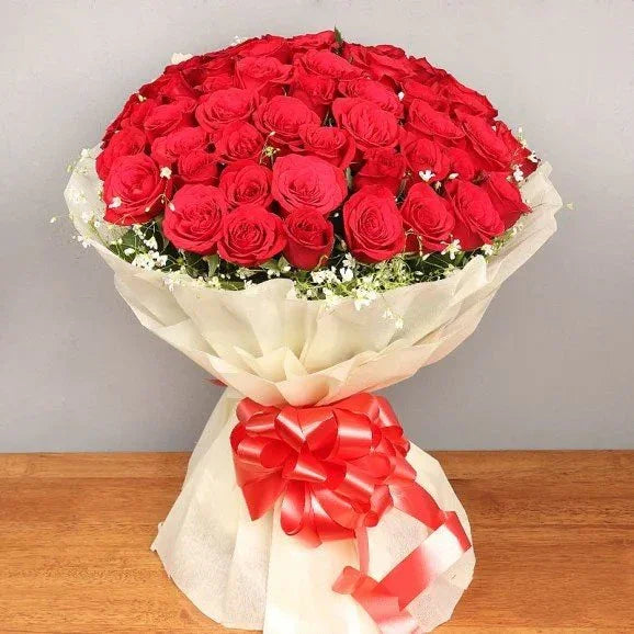 Red Roses Bouquet with 50 Fresh Roses in White Cellophane Wrap - Flower Delivery in GiftsGhaziabad