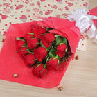12 Red Roses Hand Bouquet in Red Paper Wrap customer review image
