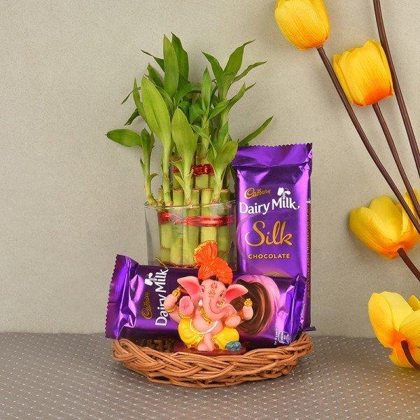 Lucky Bamboo Plant with Ganesha Idol & 2 Dairy Milk Silk Chocolates