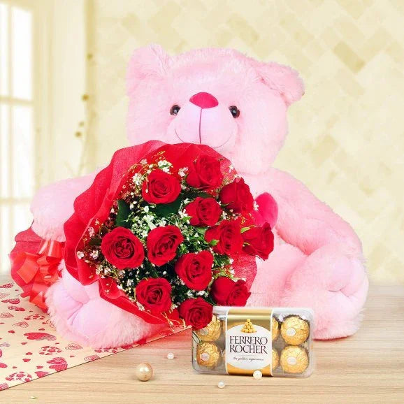 Pink teddy bear with red rose bouquet and Ferrero Rocher chocolates, perfect gift combo
