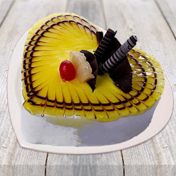 Half kg Lovely Pineapple Heart Shape Cake