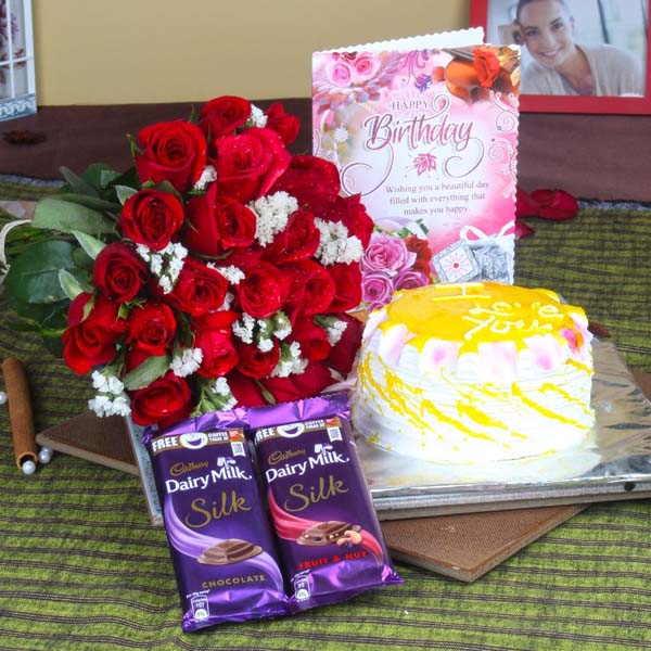 Roses with Pineapple Cake and Cadbury Silk for Birthday