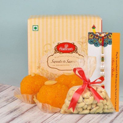 Rakhi with sweets Online Delivery - Epitome of Strength